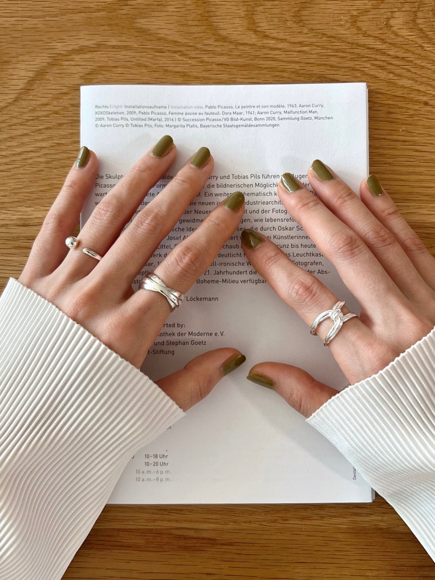 X Buckle Twist Ring