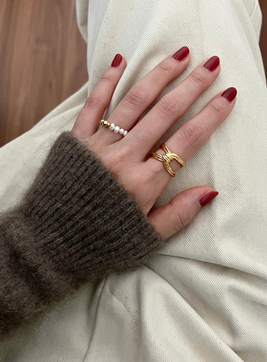X Buckle Twist Ring