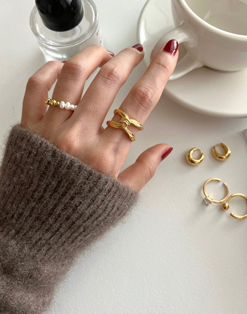 X Buckle Twist Ring